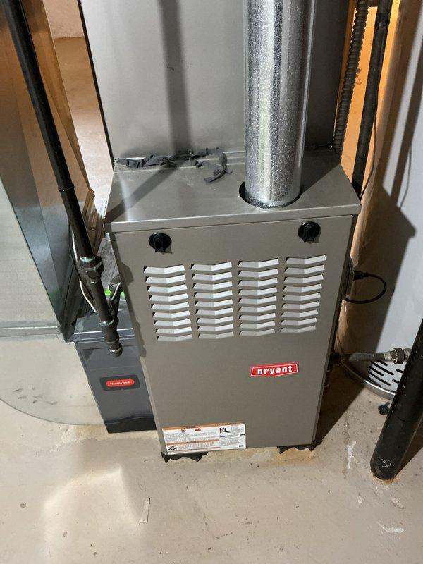 Completed scheduled tune-up and certification inspection on Bryant residential gas furnace. Performed comprehensive system evaluation including inspection of draft inducer motor, gas valve assembly, burner tubes, flame sensors, and all electrical connections. Verified proper operation of all components, confirmed safety controls functioning correctly, and documented unit condition with photographs for certification purposes.