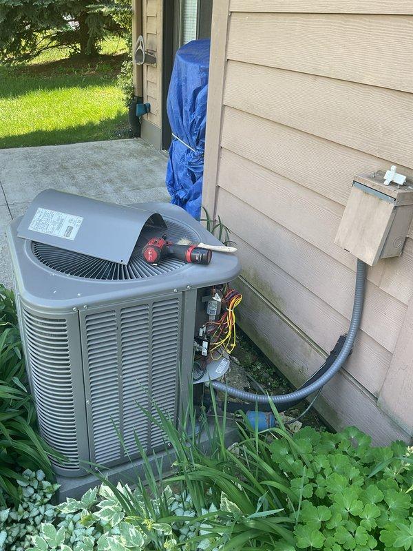 Performed comprehensive air conditioning tune-up for new customer at residential property. Completed full system inspection of outdoor condenser unit, checked electrical connections and components, verified proper refrigerant levels, and cleaned coils. Unit operating efficiently with no issues identified during maintenance visit.