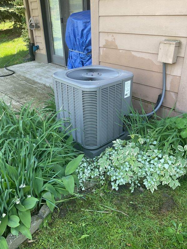 Performed comprehensive air conditioning tune-up for new customer at residential property. Completed full system inspection of outdoor condenser unit, checked electrical connections and components, verified proper refrigerant levels, and cleaned coils. Unit operating efficiently with no issues identified during maintenance visit.
