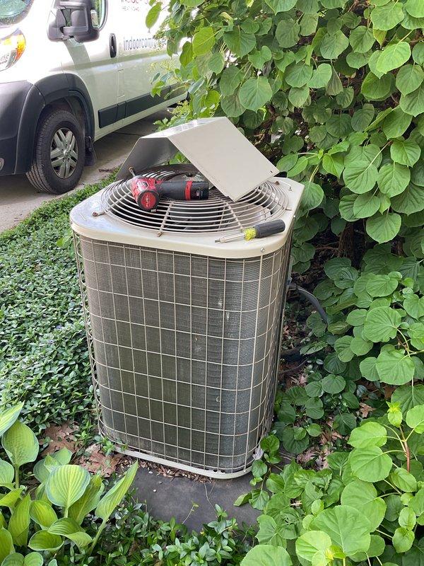 Performed comprehensive cooling season tune-up on outdoor condenser unit. Completed full system inspection, tested electrical components with multimeter, verified proper fan operation, and assessed refrigerant levels. Unit operating within normal parameters upon service completion.