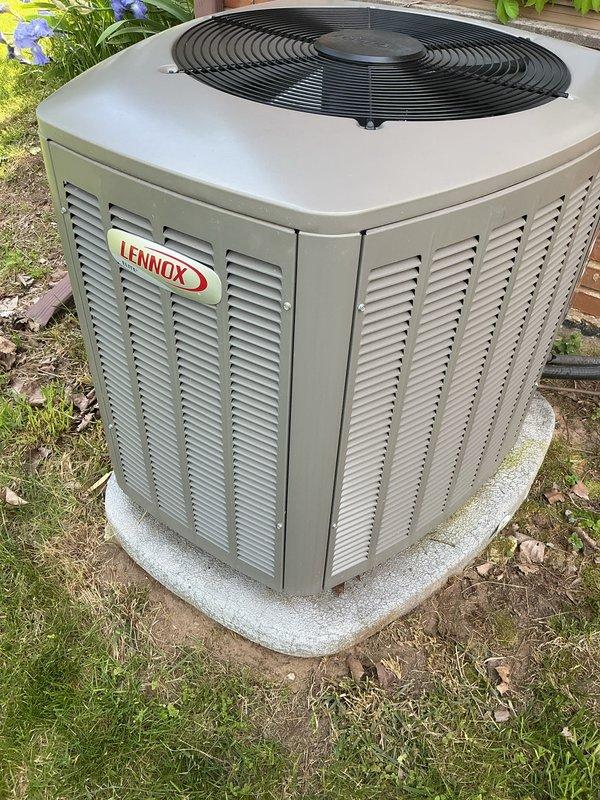 Responded to service call for noisy operation on 2-year-old Lennox air conditioning system that was still providing adequate cooling. Performed comprehensive tune-up inspection of outdoor condenser unit, checking refrigerant levels, electrical connections, and fan motor operation. Inspected condenser fan assembly and housing for potential sources of noise, verified proper airflow through louvered panels, and confirmed unit was operating within normal parameters. Also completed requested water heater tune-up and maintenance service during visit.