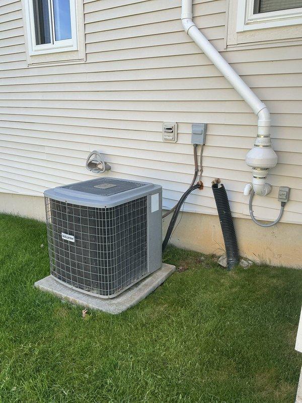 Responded to service call for uneven cooling throughout residence. Upon arrival, performed complete system inspection of split-system air conditioning unit. Examined outdoor condensing unit and verified proper operation of compressor and condenser fan motor. Inspected indoor air handler and furnace assembly in basement mechanical room. Evaluated refrigerant levels, airflow distribution, and ductwork configuration. Identified airflow restrictions and provided recommendations for system balancing to achieve even temperature distribution throughout home. Completed diagnostic assessment and discussed repair options with homeowner.