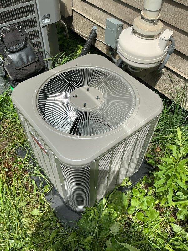 Completed routine air conditioning maintenance on residential condensing unit. Performed standard inspection of outdoor equipment, verified proper operation of condenser fan assembly with radial blade configuration, checked refrigerant levels, inspected electrical connections at disconnect box, and confirmed condensate drainage system functioning correctly. Unit operating within normal parameters upon completion of scheduled maintenance service.