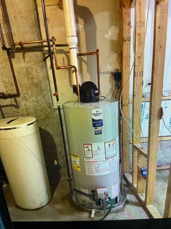 Responded to callback for reported unusual odor following recent HVAC installation. Upon arrival, conducted thorough inspection of water heater installation and gas meter connections. Examined all copper piping, valves, and fittings on water heater unit for proper installation and potential gas leaks. Inspected exterior gas meter and discovered significant corrosion on connecting pipes, which was identified as the source of concern. Verified all connections were secure and performed combustion analysis to ensure safe operation. Documented equipment conditions with photographs for service records. System operating within normal parameters with no active safety concerns detected at time of inspection.