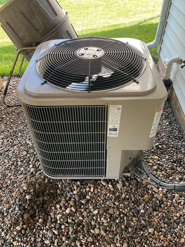 Completed preventive maintenance tune-ups on multiple air conditioning systems and gas furnace. Addressed customer concern regarding house being too cold by locating and demonstrating proper operation of HVAC damper system to allow manual adjustment of airflow distribution between zones. Inspected outdoor condensing units, confirmed proper operation of condenser fan assemblies, verified condenser coil cleanliness with no debris accumulation noted, and checked refrigerant line connections. Both units showed good overall condition with no visible signs of damage or deterioration. Answered customer questions regarding system operation and thermostat control to optimize comfort levels throughout the home.