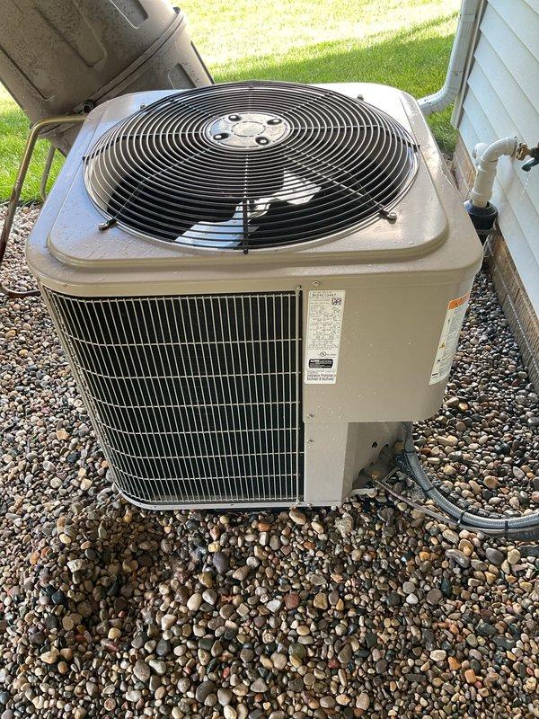Completed preventive maintenance tune-ups on multiple air conditioning systems and gas furnace. Addressed customer concern regarding house being too cold by locating and demonstrating proper operation of HVAC damper system to allow manual adjustment of airflow distribution between zones. Inspected outdoor condensing units, confirmed proper operation of condenser fan assemblies, verified condenser coil cleanliness with no debris accumulation noted, and checked refrigerant line connections. Both units showed good overall condition with no visible signs of damage or deterioration. Answered customer questions regarding system operation and thermostat control to optimize comfort levels throughout the home.