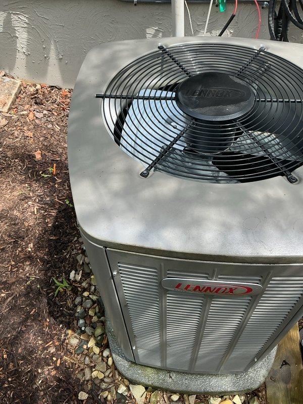 Performed routine air conditioning tune-up and preventive maintenance on residential Lennox condensing unit. Completed comprehensive system inspection, verified proper operation of all components including fan assembly and electrical connections, and confirmed unit is functioning within normal parameters for the cooling season.