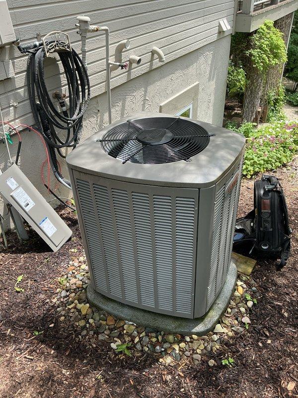 Performed routine air conditioning tune-up and preventive maintenance on residential Lennox condensing unit. Completed comprehensive system inspection, verified proper operation of all components including fan assembly and electrical connections, and confirmed unit is functioning within normal parameters for the cooling season.