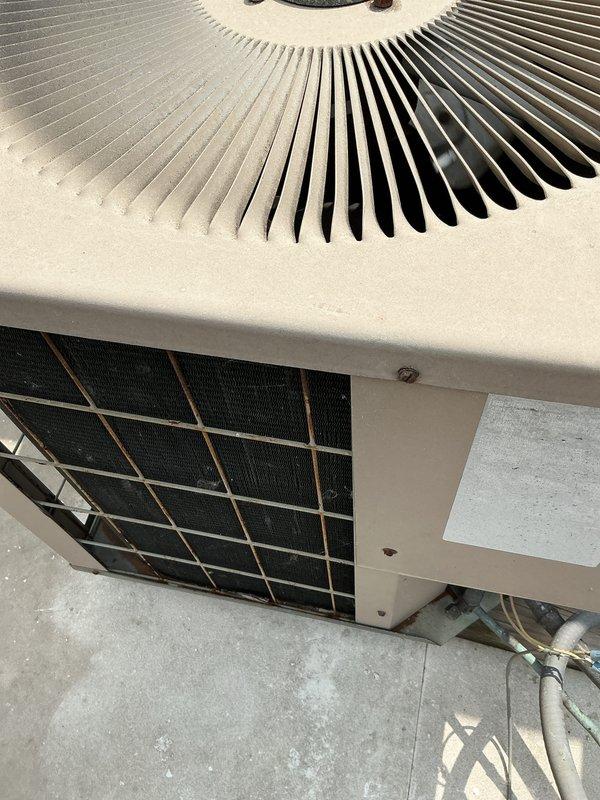 Completed comprehensive air conditioning tune-up service on residential split system. Performed standard maintenance procedures including inspection of indoor air handler with ductwork connections and outdoor condensing unit, verified refrigerant line insulation integrity, checked electrical connections, and documented equipment condition with photos. All components found operating within normal parameters with no immediate repairs required.