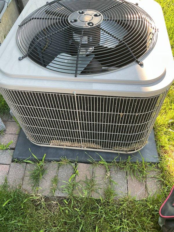 Completed annual AC tune-up on 6-year-old Comfortmaker system. Performed comprehensive maintenance inspection of outdoor condenser unit, verified proper fan operation and airflow through grille panels, checked refrigerant levels, cleaned condenser coils, inspected electrical connections and components, and confirmed system is operating within normal parameters. Unit functioning properly with no issues identified.