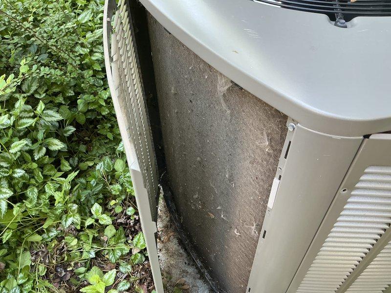Completed comprehensive AC tune-up on 3-year-old residential air conditioning system. Performed standard maintenance protocol including filter inspection, refrigerant level check, electrical connection testing, condensate drain clearing, and thermostat calibration. Noted significant dirt and debris accumulation on exterior condenser casing and surrounding vegetation encroachment requiring future attention to maintain optimal airflow and system efficiency.