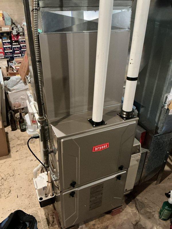 Performed annual preventative maintenance tune-up on one-year-old Bryant HVAC system. Inspected furnace and air conditioning components, verified proper operation of blower motor and electrical connections, checked refrigerant levels, cleaned condenser coils, and replaced air filter. All system components found to be in good working condition with no issues identified.
