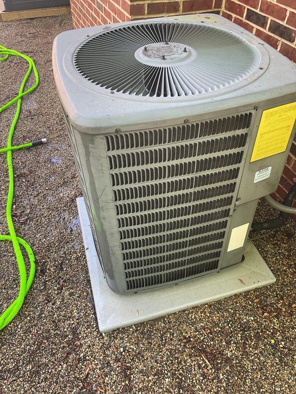 Completed annual air conditioning tune-up on outdoor condensing unit. Inspected condenser coils, verified proper fan operation, checked refrigerant levels, and tested overall system performance. Unit operating within normal parameters with no issues identified.