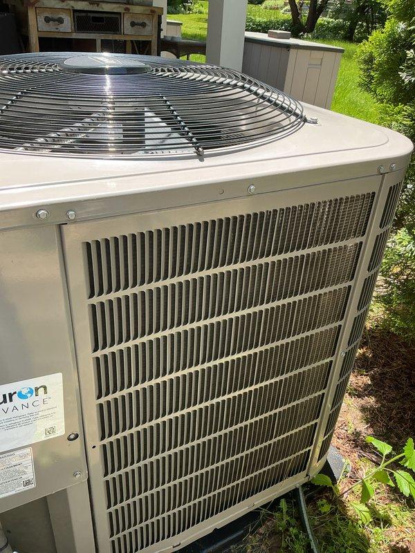 Completed preventative maintenance tune-up on a Puron ADVANCE air conditioning system less than one year old. Performed comprehensive inspection of condenser unit, verified all components operating within normal parameters, checked refrigerant levels, inspected heat exchanger fins and fan assembly, and confirmed system functionality with no issues found.