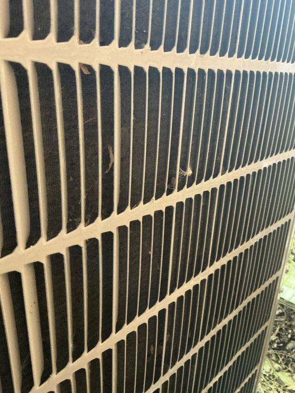 Completed comprehensive air conditioning tune-up on outdoor condensing unit. Performed standard preventive maintenance inspection, verified unit operation, and documented equipment condition with photos showing system in good working order with normal outdoor weathering.