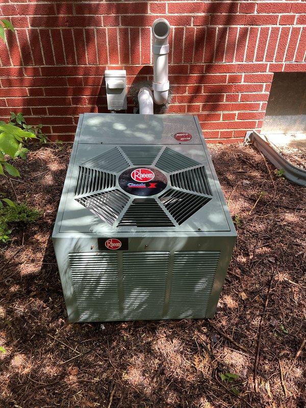 Performed comprehensive AC tune-up on 35-year-old Rheem outdoor condensing unit. Inspected condenser coils, fan assembly, refrigerant lines, and electrical connections; cleaned debris from unit exterior and surrounding area; verified proper airflow through louvers and fan operation. System tested and confirmed operational with all components functioning within normal parameters.