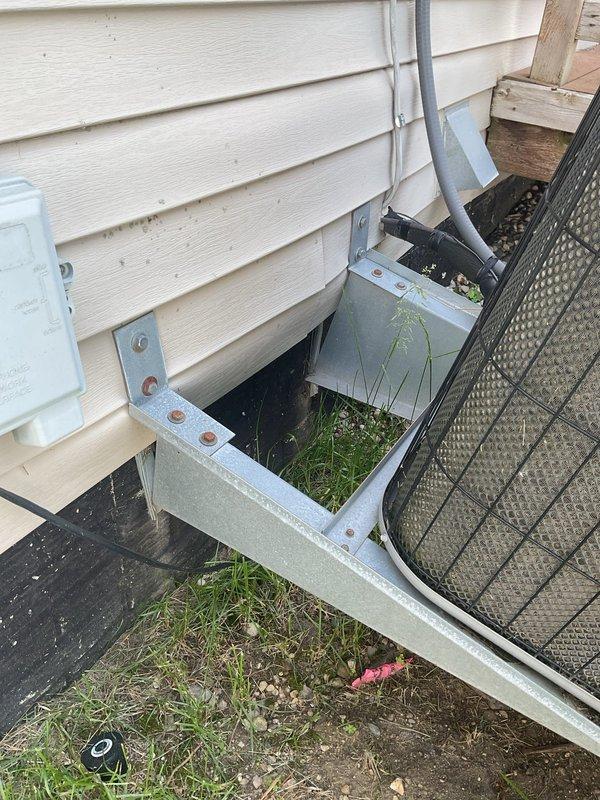 Completed comprehensive AC tune-up on residential outdoor condensing unit. Performed standard maintenance inspection, verified system operation, and documented equipment condition with photos. Unit accessed and serviced at exterior location adjacent to foundation with all components functioning properly upon completion.