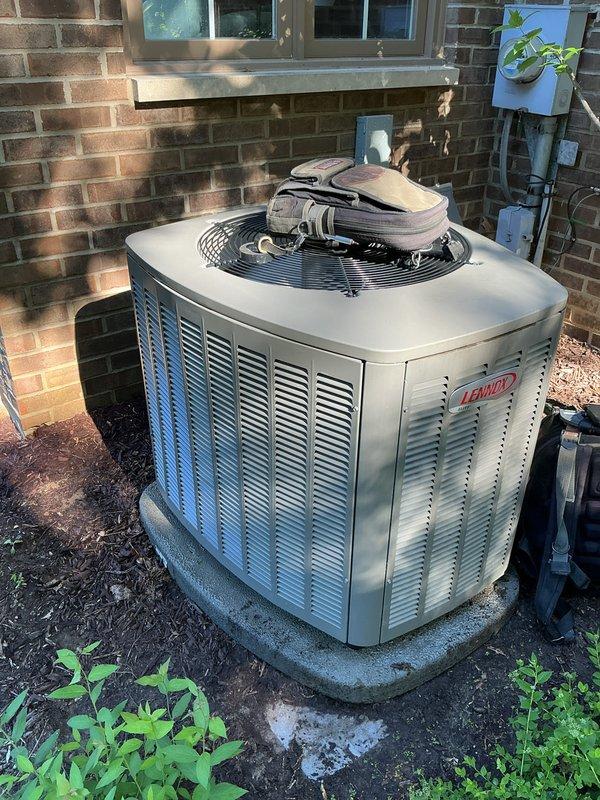 Performed annual preventive maintenance on one-year-old Lennox air conditioning system. Completed comprehensive tune-up including inspection of condenser unit, fan assembly, and electrical components. System operating properly in cooling mode with all components functioning within manufacturer specifications.