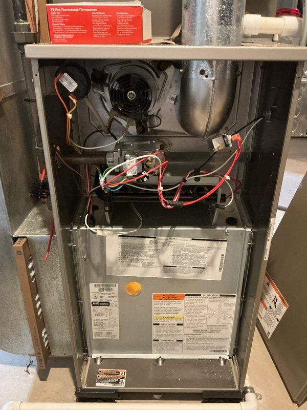 Completed comprehensive multi-system tune-up service including air conditioning unit, gas furnace, and water heater. Performed thorough inspection of furnace interior components including blower motor assembly, heat exchanger, electrical connections, and control wiring. Verified proper operation of all mechanical and electrical systems, checked safety controls, and confirmed unit specifications against manufacturer labels. All equipment found operating within normal parameters and ready for continued service.
