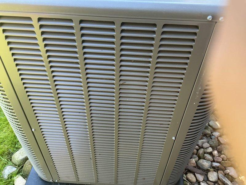 Performed comprehensive annual air conditioning tune-up on 2-year-old outdoor condensing unit. Completed standard maintenance protocol including inspection of all accessible components, verification of proper airflow through condenser coils and louvers, and assessment of unit's overall operational condition. Unit found to be in good working order with normal weathering for age; all protective panels and grilles intact and secure.