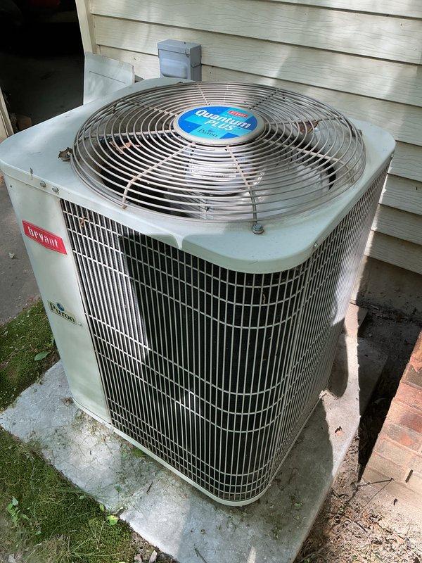 Completed annual cooling maintenance on 20-year-old Bryant air conditioning system. Performed comprehensive tune-up inspection of outdoor condenser unit, replaced failed capacitor showing visible signs of deterioration and oxidation, and installed new air filter per customer request. System tested and operating properly following component replacement and routine maintenance procedures.