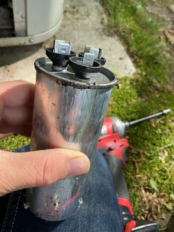 Completed annual cooling maintenance on 20-year-old Bryant air conditioning system. Performed comprehensive tune-up inspection of outdoor condenser unit, replaced failed capacitor showing visible signs of deterioration and oxidation, and installed new air filter per customer request. System tested and operating properly following component replacement and routine maintenance procedures.