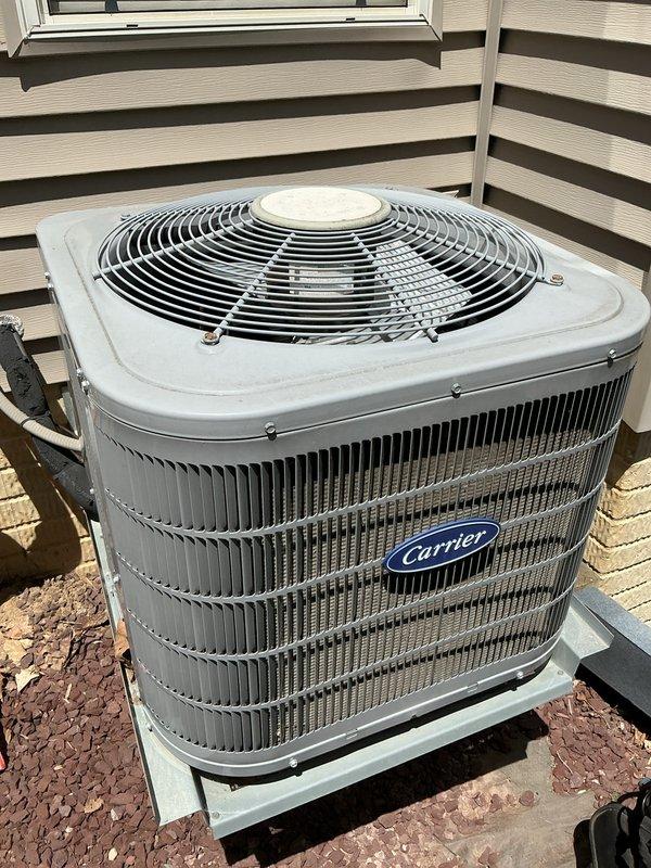 Completed comprehensive air conditioning tune-up on Carrier condenser unit. Performed full system inspection, cleaned condenser coils, verified refrigerant levels, tested electrical connections, and confirmed proper fan operation. Unit is operating efficiently with no issues identified; all components found to be in good working condition.