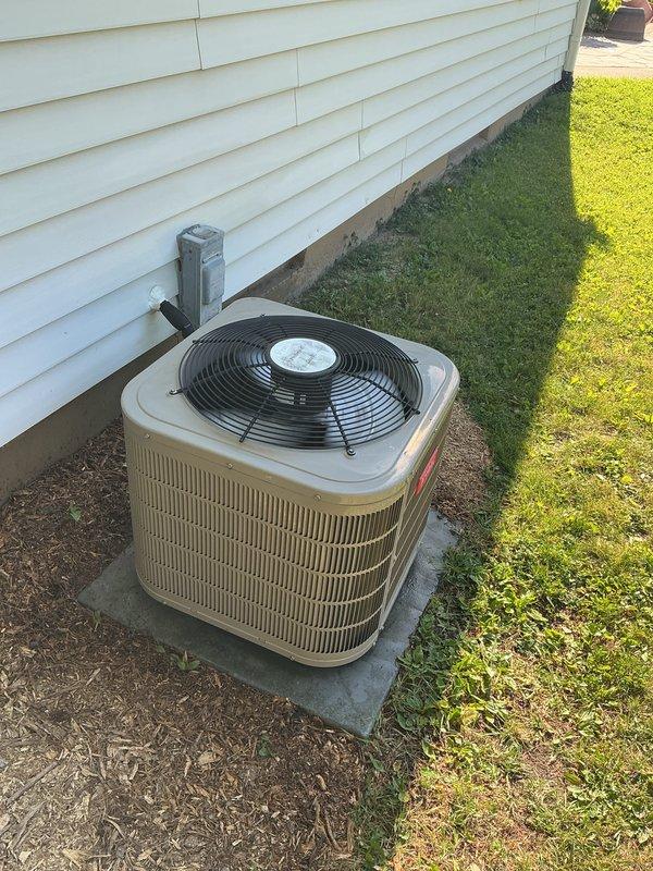 Completed scheduled air conditioning tune-up on 2015 Bryant condensing unit. Performed comprehensive preventive maintenance including inspection of refrigerant lines, electrical connections at disconnect box, condenser coil cleaning, fan motor operation verification, and overall system performance evaluation. Unit operating within normal parameters with no issues identified.