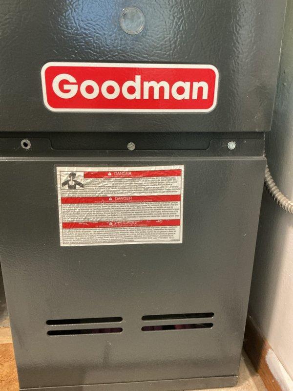 Completed comprehensive tune-up and safety inspection on Goodman gas furnace system located in residential utility closet. Performed full system evaluation including visual inspection of heat exchanger, burner assembly, and all safety controls. Verified proper operation of blower motor, checked electrical connections, and tested ignition system. Inspected venting system and PVC condensate drain line for proper installation and function. Examined refrigerant lines and ductwork connections for secure mounting and adequate sealing. All components found operating within manufacturer specifications with no safety concerns identified. Completed required municipal inspection documentation on-site as requested.