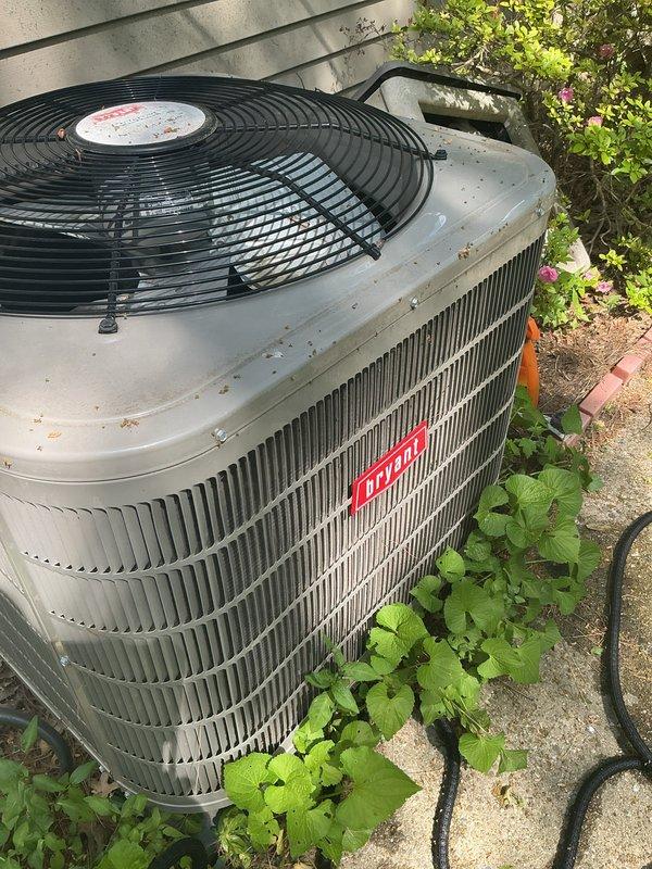 Completed annual air conditioning tune-up on Bryant outdoor condensing unit. System evaluated and serviced as part of recurring maintenance agreement, with unit returned to proper operating condition. Customer account updated to include hot water tank for future service coverage.