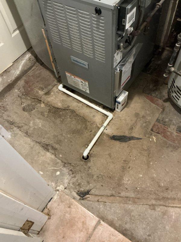 Completed installation of new 2.5-ton Goodman air conditioning condenser unit (model 134SANG3284N) with matching indoor evaporator coil. The outdoor condenser was installed with proper refrigerant charge of 1.98 lbs R-410A, factory-equipped with TXV metering device, and connected to 208-230V single-phase electrical supply. Indoor furnace and coil assembly was positioned on condensate drain pan with PVC drainage line properly routed to floor drain. All electrical connections were verified per manufacturer specifications, including compressor RLA of 43.50 amps and LRA of 82.5 amps. System was tested for proper operation, airflow, and refrigerant pressures to ensure optimal performance.