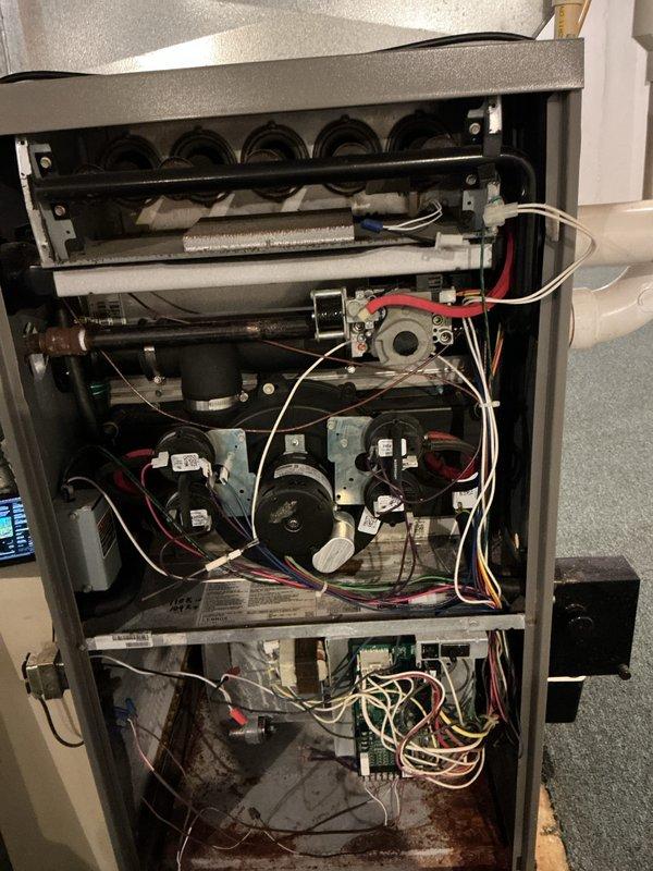 Performed comprehensive tune-up service on multiple HVAC systems including gas furnace and Evcon brand air conditioning condenser unit in preparation for home sale. Conducted thorough inspection of all mechanical and electrical components, verified proper operation of blower assemblies, gas valve, heat exchanger, control boards, and outdoor condenser unit with fan assembly. All systems found to be operating within normal parameters with no immediate repairs required at time of service.