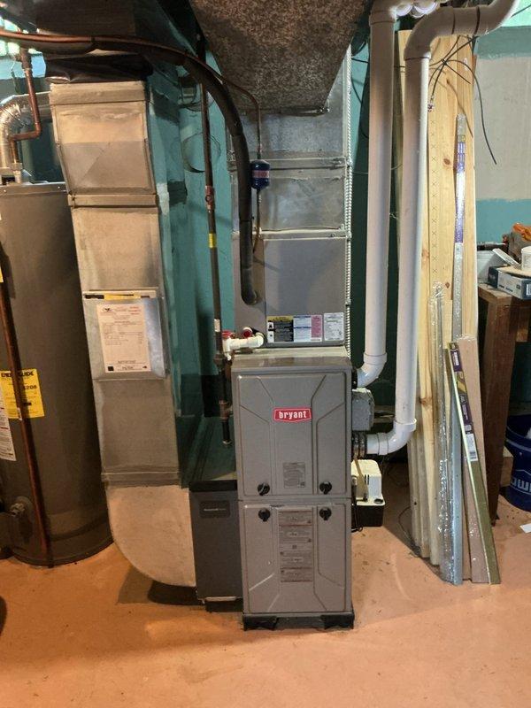 Responded to callback for non-operational air conditioning system following recent tune-up service where refrigerant was added. Upon arrival, customer was unavailable for consultation. Performed diagnostic assessment of Bryant HVAC system located in basement utility area. System evaluation completed and refrigerant charge verified. Follow-up appointment scheduled to address ongoing operational concerns.
