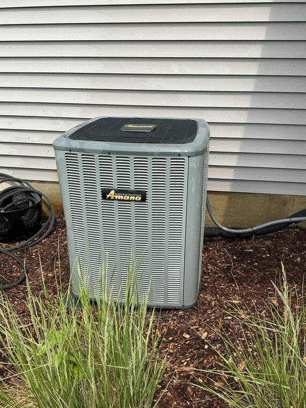 Completed annual AC tune-up on Amana outdoor condensing unit. Performed comprehensive system inspection, verified refrigerant charge, cleaned condenser coils, checked electrical connections, and confirmed proper operation of all components. Unit operating within manufacturer specifications at time of service.