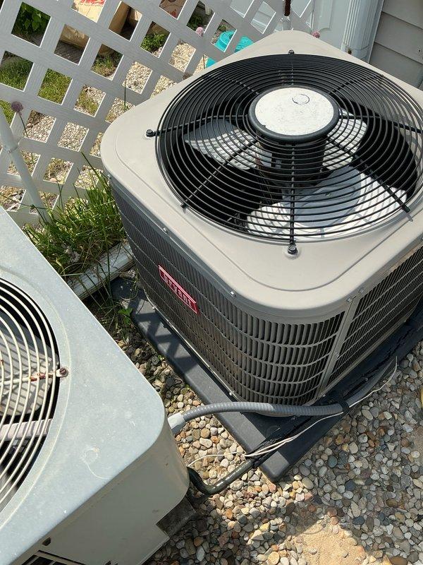 Performed routine preventative maintenance on a five-year-old residential air conditioning system with two outdoor condensing units. Completed comprehensive tune-up including inspection of condenser coils, fan assemblies, refrigerant lines, and electrical connections. System operating within normal parameters with no deficiencies noted at time of service.