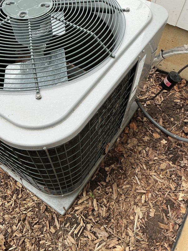 Completed scheduled AC tune-up on two outdoor condenser units as part of prepaid maintenance service. Performed comprehensive system inspection, verified proper operation of both units, and documented equipment condition with photos showing units in good operational status with normal weathering on exterior components.