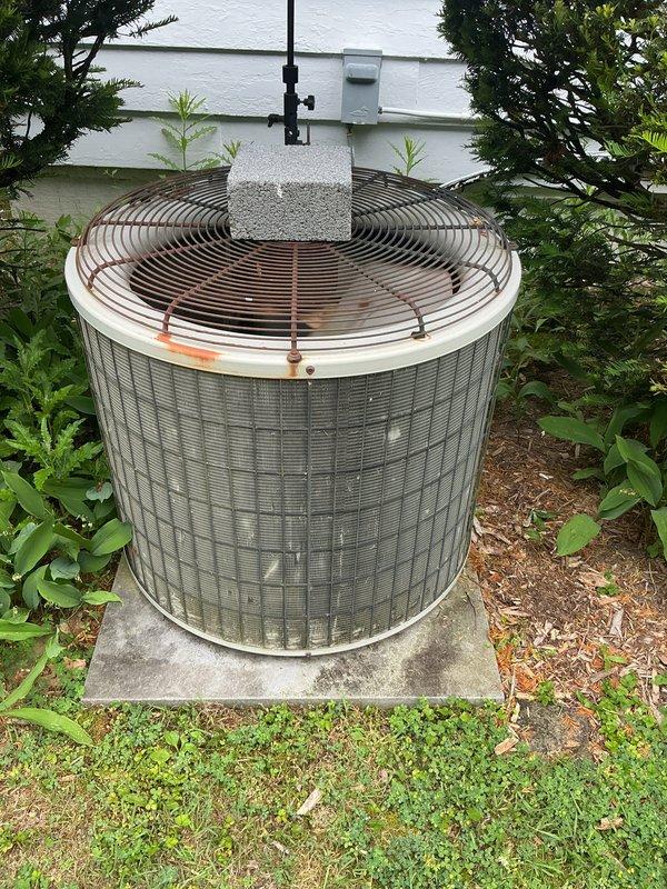 Completed annual air conditioning maintenance and tune-up on residential outdoor condenser unit. Performed comprehensive system inspection, verified proper operation of compressor and fan motor, checked refrigerant levels, and cleaned condenser coils. Discussed billing structure changes with customer regarding separate AC service payments versus consolidated billing approach; customer expressed questions about new payment arrangement and requested follow-up discussion with management regarding pricing structure.