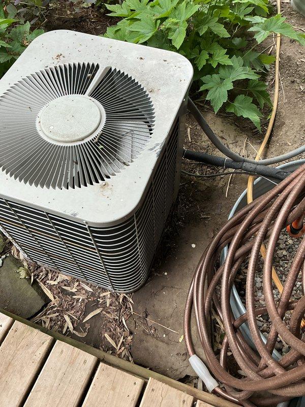 Completed comprehensive air conditioning tune-up on outdoor condenser unit. Performed standard preventive maintenance procedures including inspection of all major components, cleaning of condenser coils, verification of refrigerant levels, testing of electrical connections, and assessment of overall system operation. Unit found to be in satisfactory working condition with normal weathering present on exterior casing. Collected payment for service agreement renewal and confirmed future maintenance appointment.