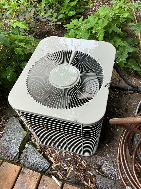 Completed comprehensive air conditioning tune-up on outdoor condenser unit. Performed standard preventive maintenance procedures including inspection of all major components, cleaning of condenser coils, verification of refrigerant levels, testing of electrical connections, and assessment of overall system operation. Unit found to be in satisfactory working condition with normal weathering present on exterior casing. Collected payment for service agreement renewal and confirmed future maintenance appointment.