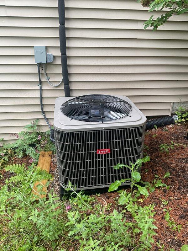 Completed scheduled air conditioning tune-up on Bryant outdoor condensing unit. Performed comprehensive preventive maintenance inspection including verification of refrigerant levels, electrical connections, fan motor operation, and overall system performance. Unit is operating within normal parameters with proper airflow through condenser coils and adequate clearance maintained around equipment for optimal performance.