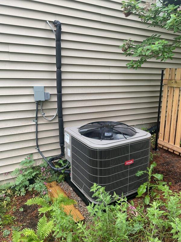 Completed scheduled air conditioning tune-up on Bryant outdoor condensing unit. Performed comprehensive preventive maintenance inspection including verification of refrigerant levels, electrical connections, fan motor operation, and overall system performance. Unit is operating within normal parameters with proper airflow through condenser coils and adequate clearance maintained around equipment for optimal performance.