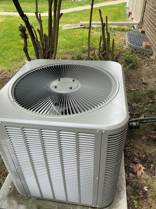 Completed scheduled AC tune-up on outdoor condensing unit. Upon arrival, found condenser coil heavily soiled with cottonwood seeds, pollen, and organic debris significantly restricting airflow through fins. Cleaned condenser coil, removed debris from unit exterior and surrounding pad area, and performed standard maintenance inspection of all accessible components. Unit operating within normal parameters upon completion.