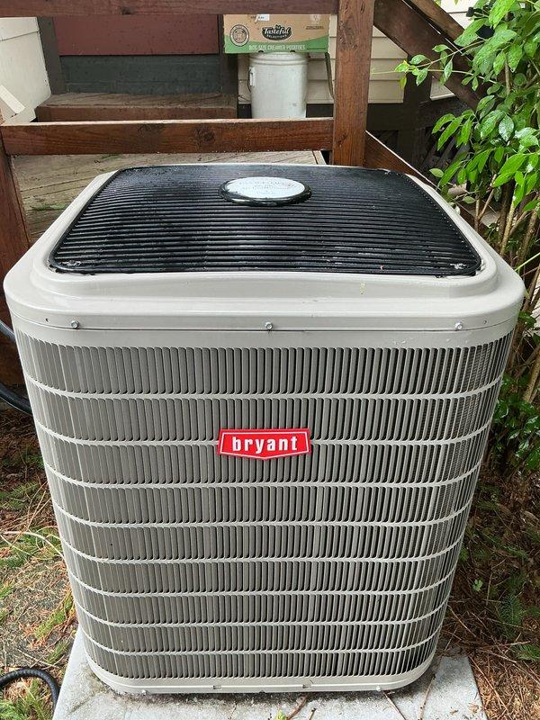 Completed comprehensive air conditioning tune-up on Bryant outdoor condensing unit. Performed standard preventive maintenance procedures including inspection of all major components, cleaning of condenser coils, verification of proper airflow through louvered panels, and operational testing to ensure system cooling performance meets manufacturer specifications.