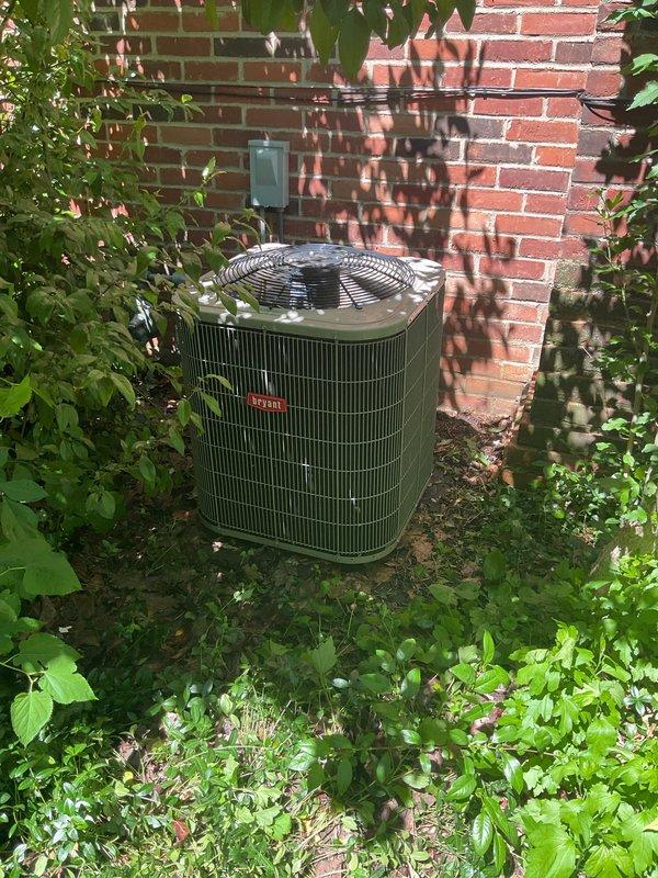 Responded to no cooling call on 12-year-old residential air conditioning system. Upon arrival, found outdoor condenser unit surrounded by overgrown vegetation and debris, restricting airflow to unit. Performed comprehensive system diagnostic to identify cause of complete cooling failure. Customer requested service be converted to preventative maintenance tuneup during visit. Conducted full AC tuneup including inspection of condenser coils, electrical connections, refrigerant levels, and overall system operation. Cleared vegetation and debris from around condenser unit to restore proper airflow clearance. Unit operational following service, though original cooling issue may require additional repair work beyond standard maintenance scope.