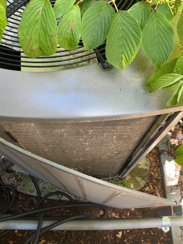 Completed annual air conditioning tune-up on 2022 outdoor condensing unit. Performed standard maintenance inspection including checking refrigerant levels, electrical connections, and fan operation. Unit operating within normal parameters with visible debris accumulation around outdoor coil requiring attention during service.