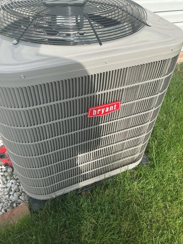 Completed comprehensive multi-system tune-up on Bryant air conditioning unit and hot water heater. Performed standard preventive maintenance procedures including inspection of condenser unit exterior condition, verification of proper airflow through vertical fin grille assembly, and assessment of overall system operation. Unit showed good operating condition with no visible deterioration or damage to housing, fins, or protective fan guard. Customer expressed interest in air purification upgrade options and renewal was processed on-site.