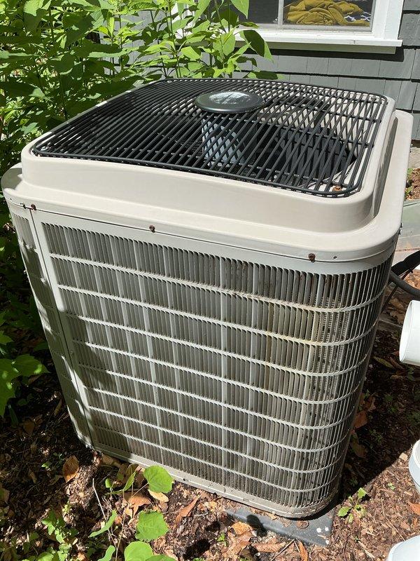 Completed annual air conditioning tune-up on 12-year-old outdoor condensing unit. Performed comprehensive maintenance inspection, verified system operation, and processed customer's AC/ground fault protection plan renewal. Unit exterior and coils appear well-maintained with proper clearance from surrounding vegetation.