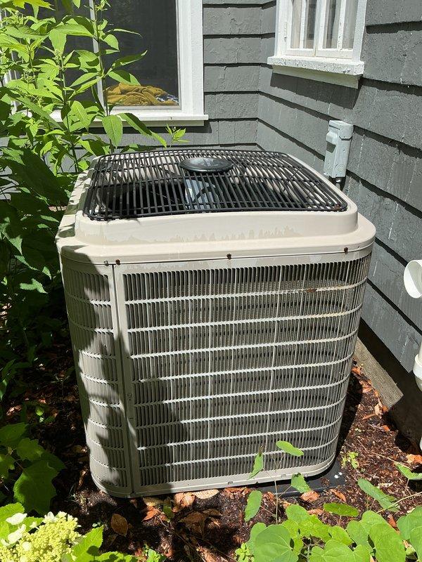 Completed annual air conditioning tune-up on 12-year-old outdoor condensing unit. Performed comprehensive maintenance inspection, verified system operation, and processed customer's AC/ground fault protection plan renewal. Unit exterior and coils appear well-maintained with proper clearance from surrounding vegetation.