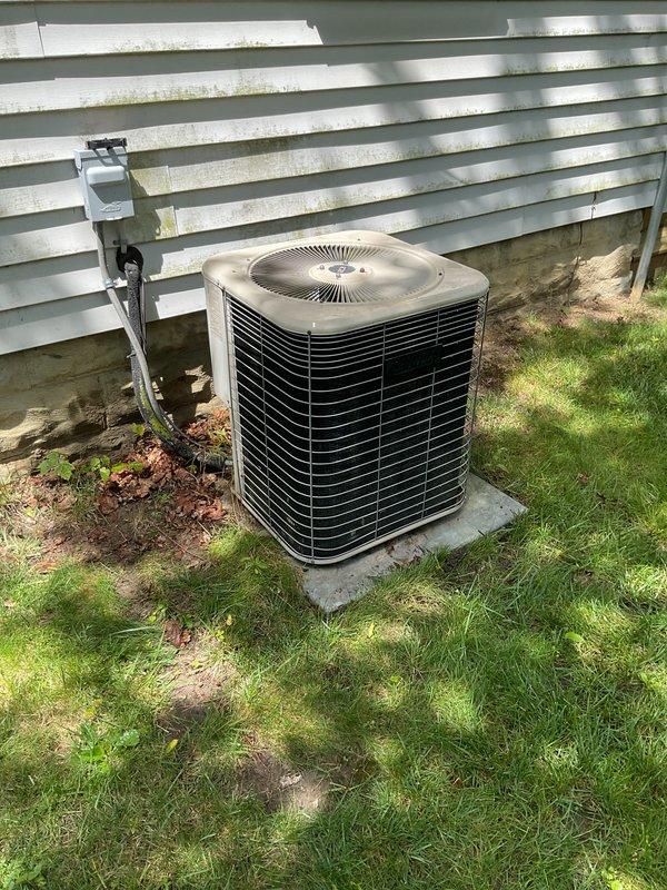 Completed comprehensive air conditioning tune-up and preventative maintenance on outdoor condensing unit. Performed standard seasonal inspection including cleaning of condenser coils, verification of electrical connections at disconnect box, refrigerant level assessment, and operational testing of fan motor and compressor. Unit found to be operating within normal parameters with no immediate service needs identified.
