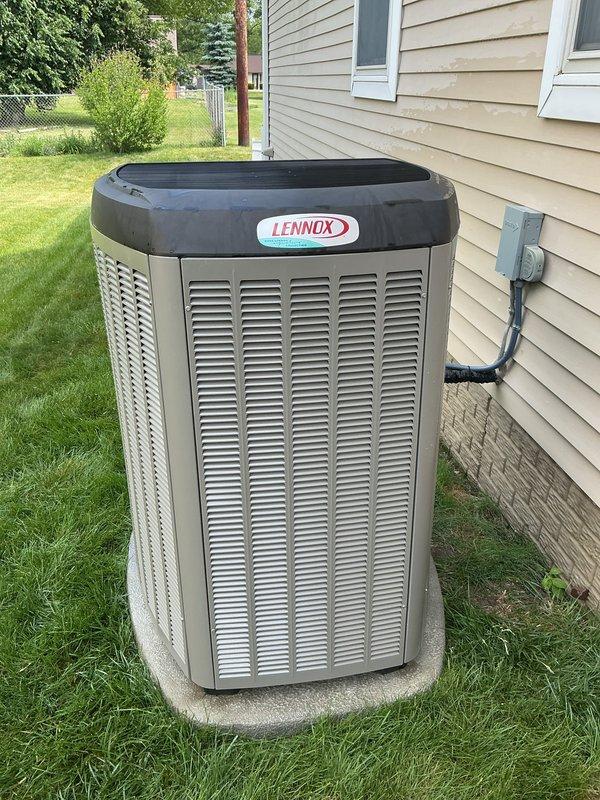 Installed replacement condenser circuit board (11H36) on Lennox condensing unit to restore cooling capability while condenser fan motor (98M39) remains on backorder from manufacturer. Performed air conditioning tune-up including system inspection, filter replacement, and verification of proper operation with newly installed control board. Unit is operating and providing cooling; will return to install condenser fan motor once part arrives to complete warranty repairs.